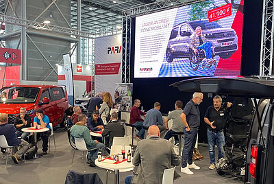 View of the large LED screen at the Paravan exhibition stand 2024