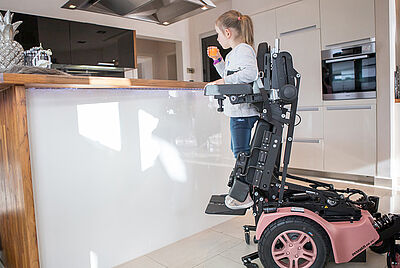 With the standing function, a child in the PR 35 S can independently get a drink from the kitchen counter.