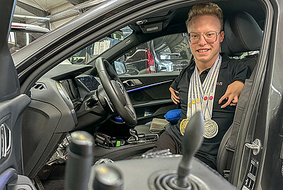 A satisfied user independently exits a vehicle using a PARAVAN wheelchair – inclusion in action.