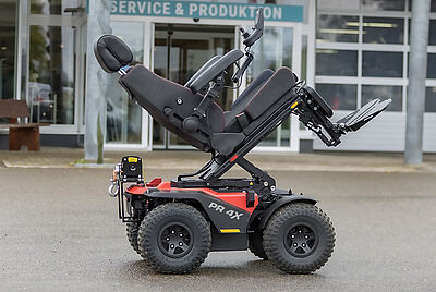 Two PR4x wheelchairs in green next to each other